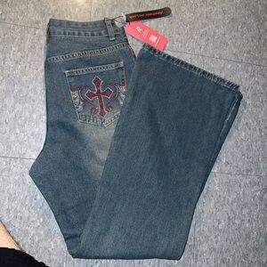 Cross embellished jeans